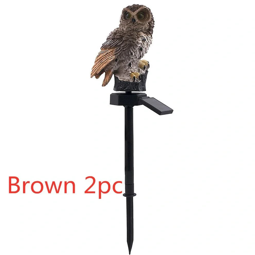 Solar owl garden light with realistic design standing 45cm tall, featuring LED illumination and solar panel