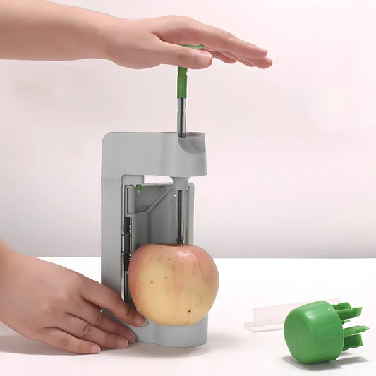 Green and white kitchen fruit slicer with 8mm blades on 22.5cm frame