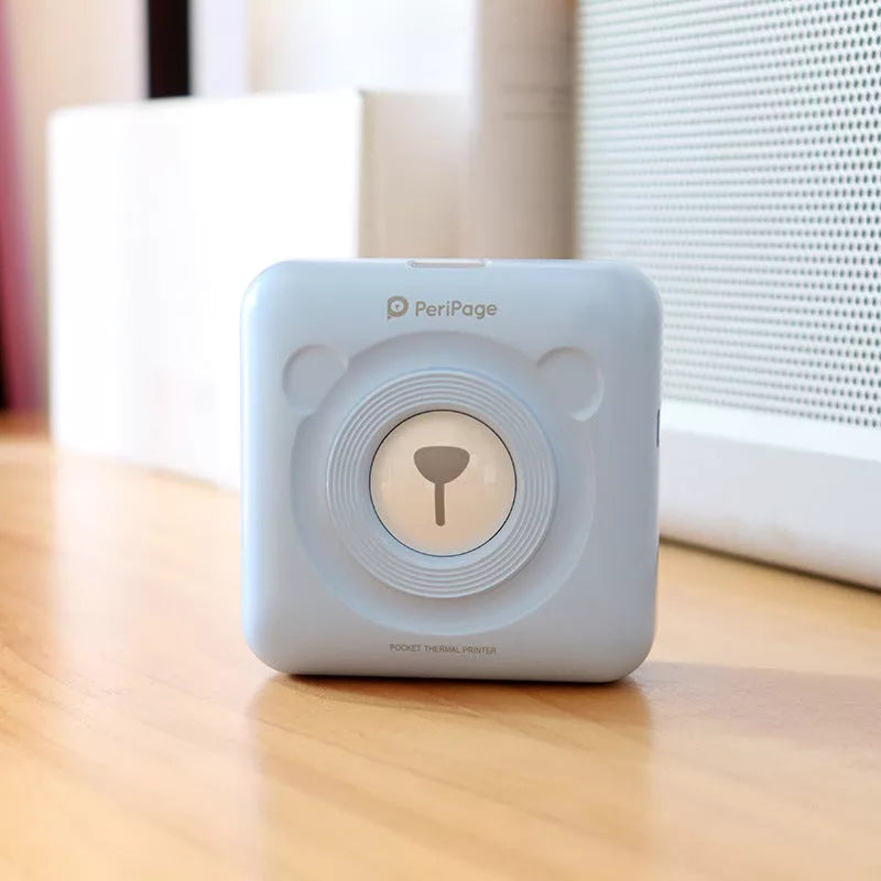 Portable Handheld Label Mini Thermal Printer in white, pink, or blue