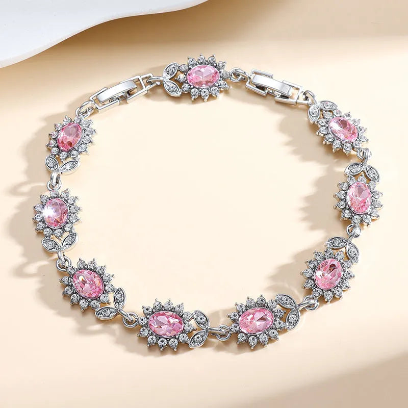 Personality Trend women's simple bracelet with inlaid zircon stones in a choice of nine gemstone colours on a wrist.