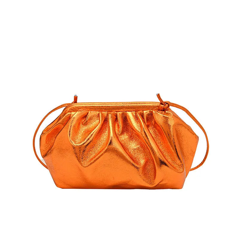 Simple hair clip closure crossbody bag in shell shape with sewing line detail on rose red PU material
