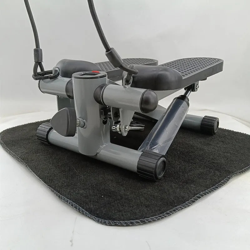 Silver grey hydraulic mini treadmill with stepping pedals for home waist slimming exercises