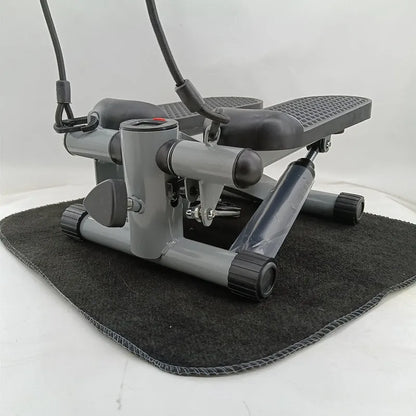Silver grey hydraulic mini treadmill with stepping pedals for home waist slimming exercises