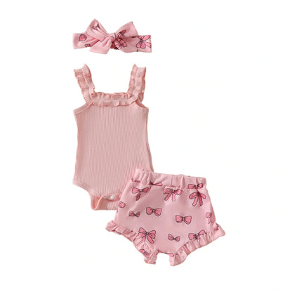 Girls' pink cotton romper and shorts two-piece set with included hair accessory