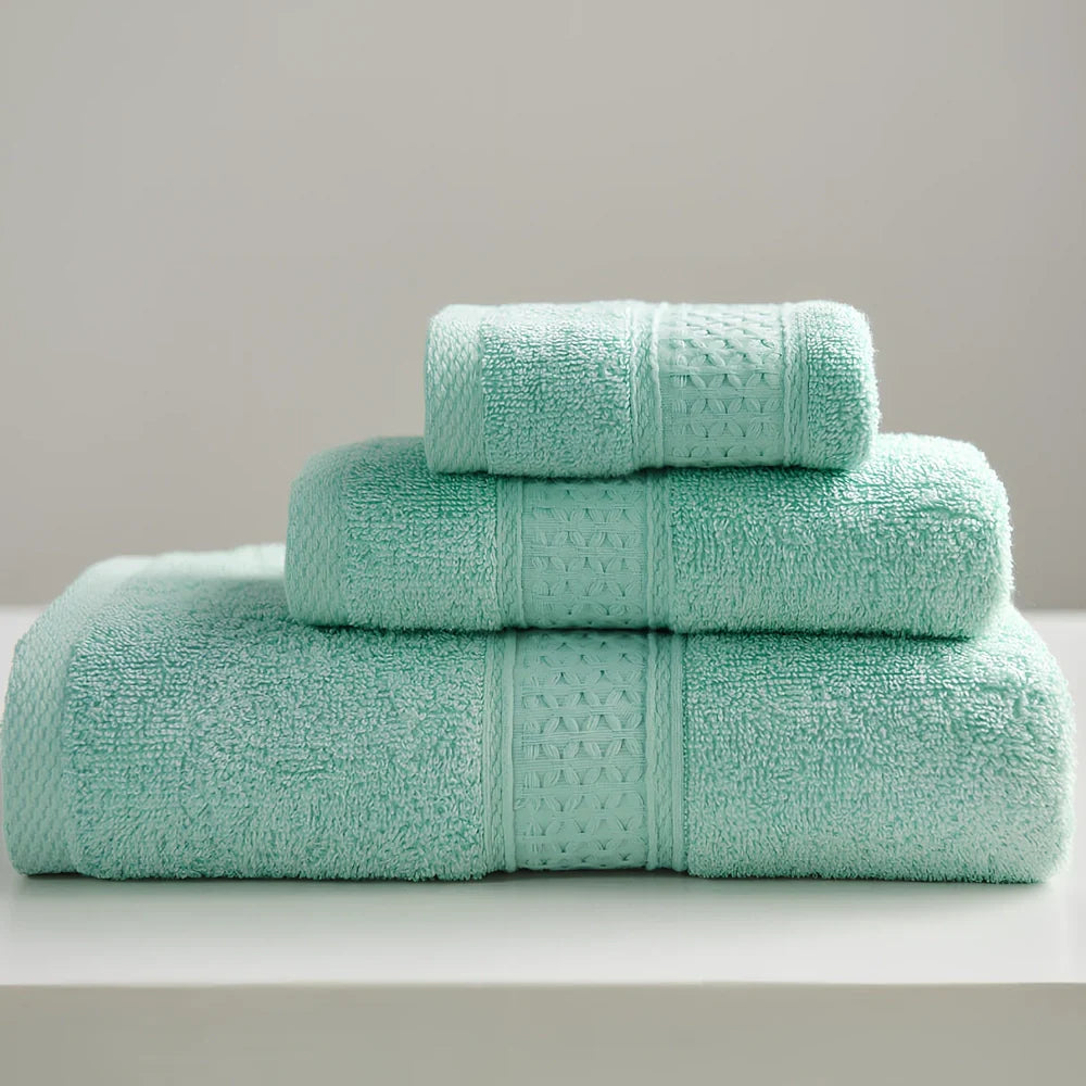Three cotton towels: 33cm square, 32cm×73cm standard, 70cm×140cm bath towel in coordinated colours