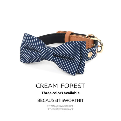 Cotton dog collar with detachable bow in Dark Blue, showing optional leather lettering and 2cm wide rope
