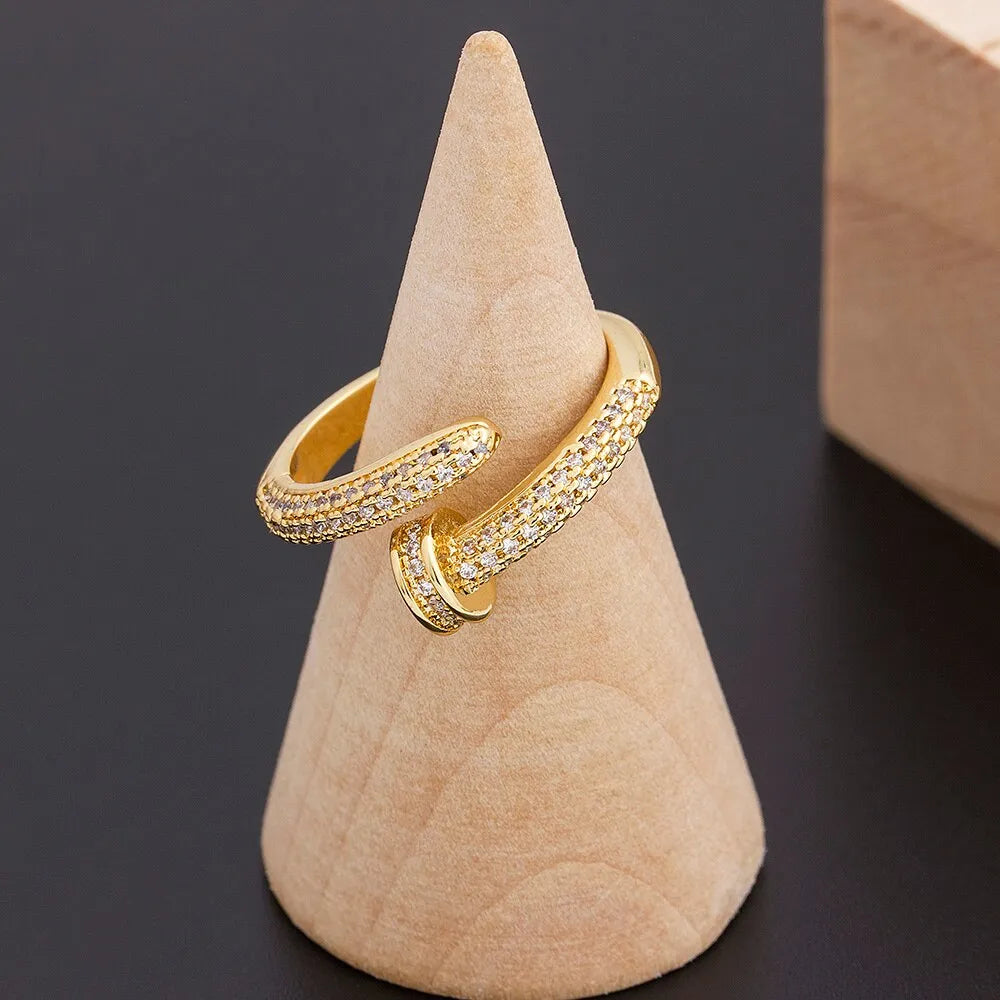 Personalized nail ring in gold with geometric metal design and inlaid drill detail, adjustable opening