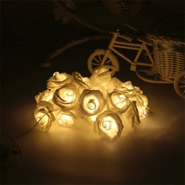 Battery-powered rose flower string lights in various colors and lengths, suitable for holiday, wedding, and party decor