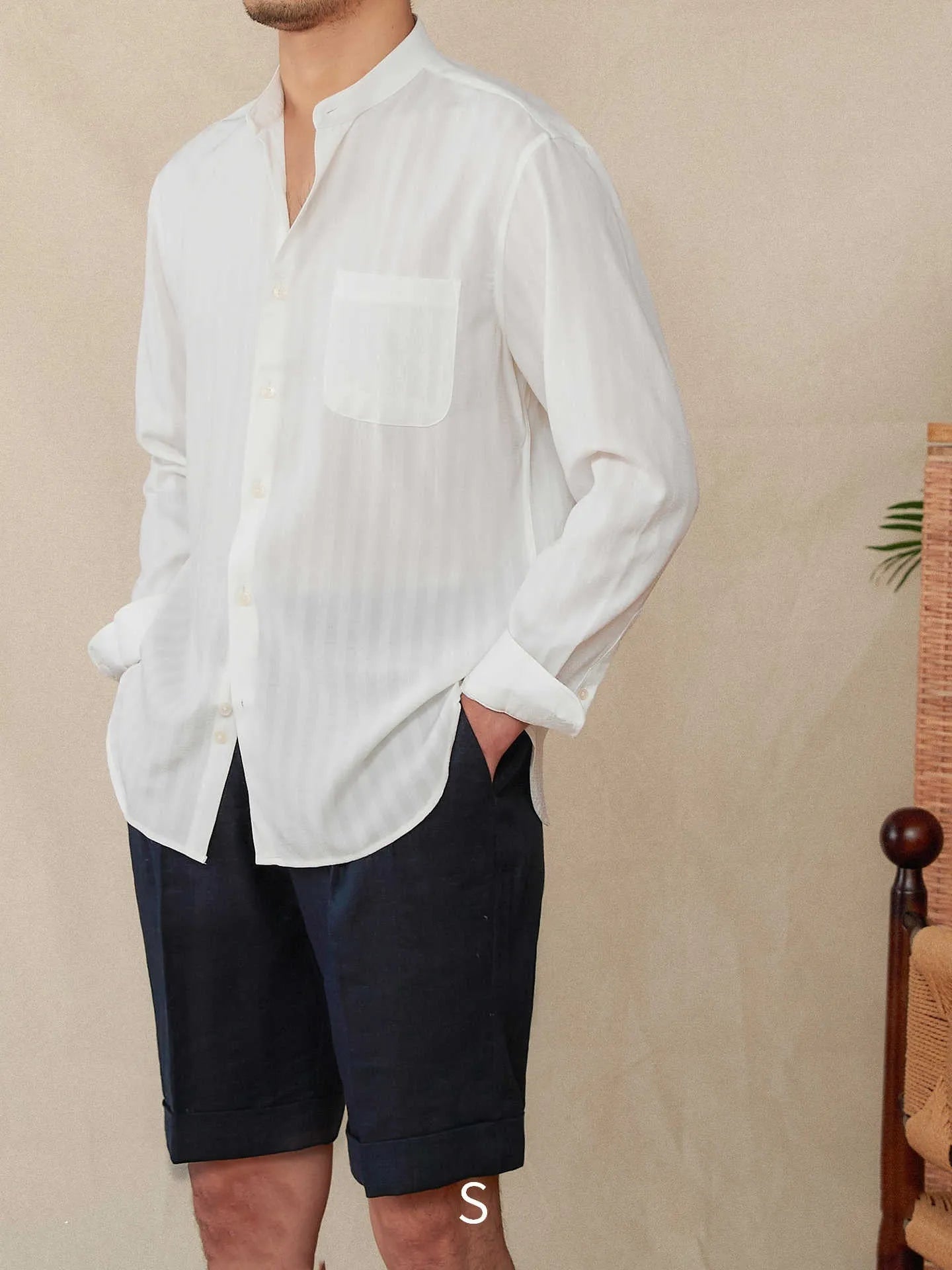 Blue and white seersucker stripe long sleeve shirt with a loose lapel baseball collar