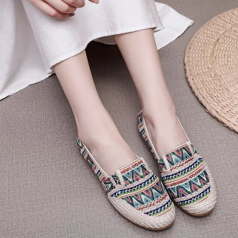 Women's ethnic style cloth shoes with shallow mouth design, colour stitching, and flat heel