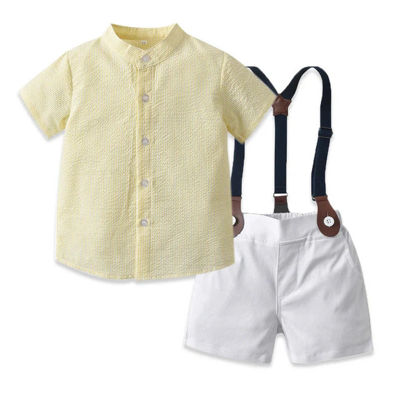 Girl wearing yellow plaid princess cotton dress with matching lace straw hat summer set
