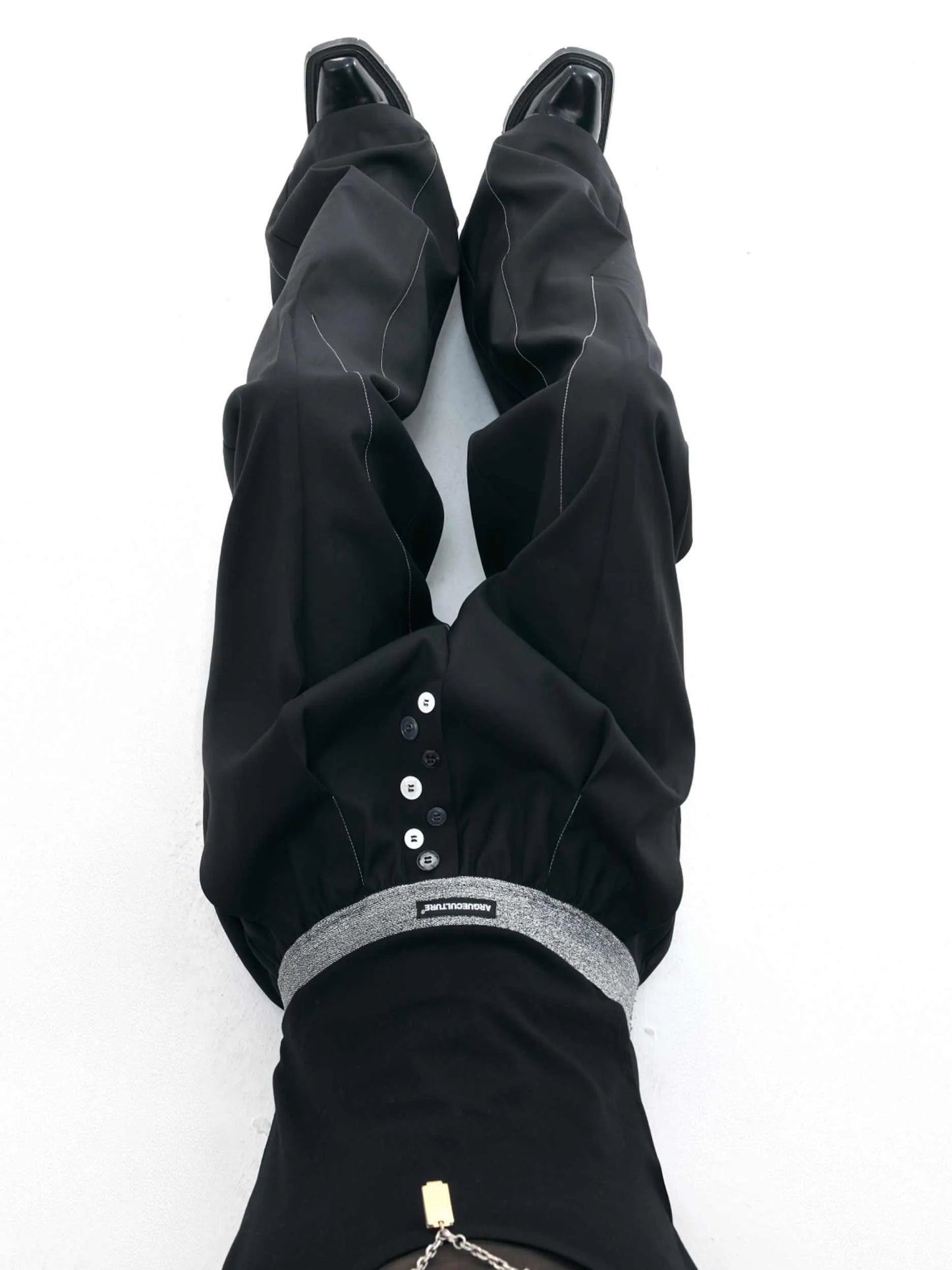 Drooping straight suit pants in black or grey with high waist and button open line design, straight-leg cut