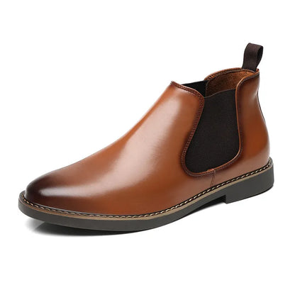 Black and brown formal pointed-toe leather boots with a square heel on a rubber sole.