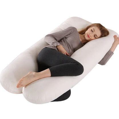 Large U-shaped pregnancy support pillow with removable cover and abdominal support belt.