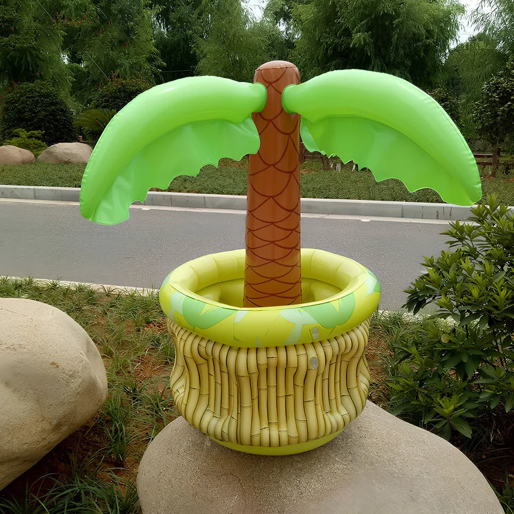 Green inflatable palm tree shaped cooler with coconut details holding beer bottles and ice
