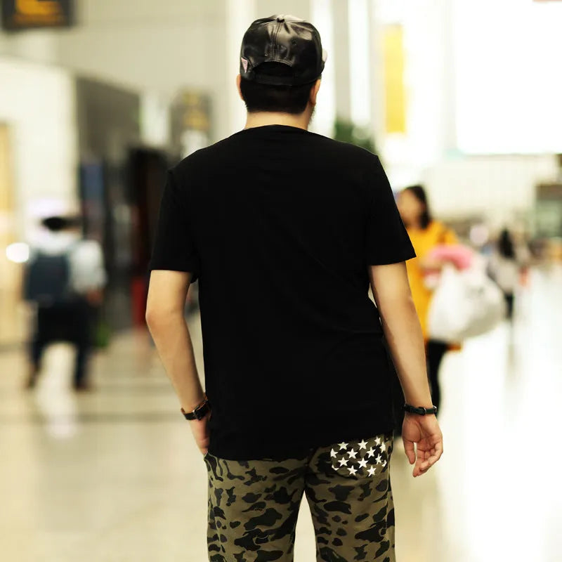 Black plus-size T-shirt with geometric print, loose fit, short sleeves, round neck, sizes XXL to 7XL.