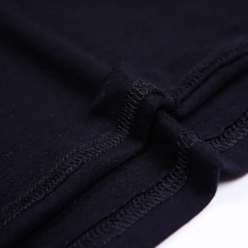 Black plus-size T-shirt with geometric print, loose fit, short sleeves, round neck, sizes XXL to 7XL.
