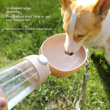 Portable dog water bottle with feeder bowl in brown, pink, or yellow colours for outdoor pet travel