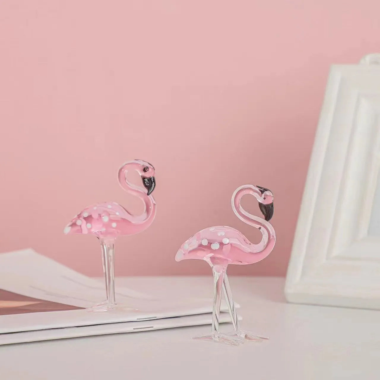 Pink crystal flamingo decorative ornament on table, 15cm tall with modern simplicity design