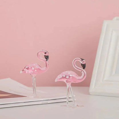 Pink crystal flamingo decorative ornament on table, 15cm tall with modern simplicity design