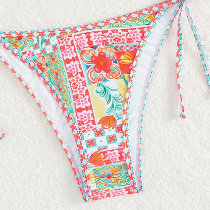 Women's lace-up front split design swimsuit bikini set in polyester with spandex lining.