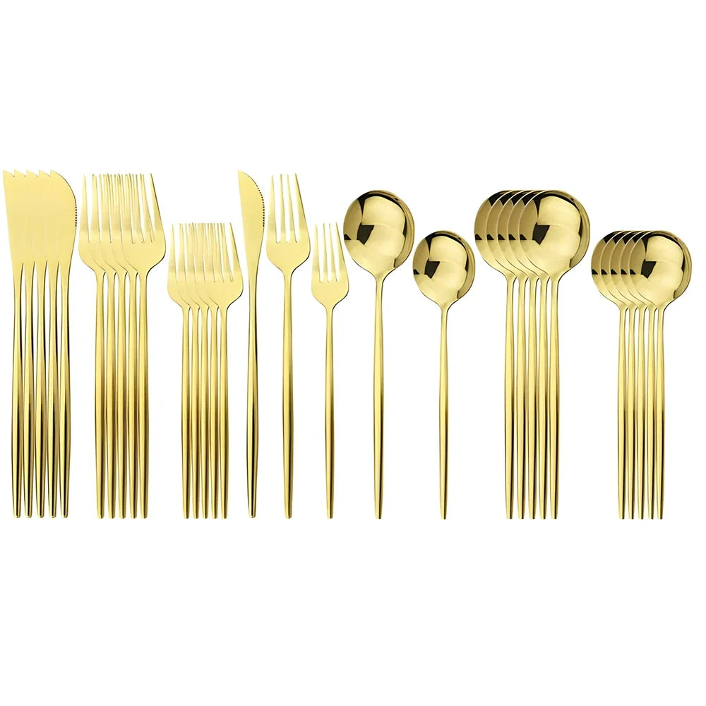 36-piece stainless steel cutlery set with mirror-polished table knives, forks, spoons, dessert forks, and dessert spoons arranged for six place settings