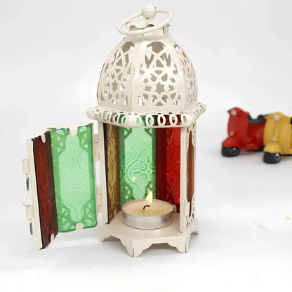 Wrought iron candle holder with 16cm height and 7cm diameter in black finish showing hanging design