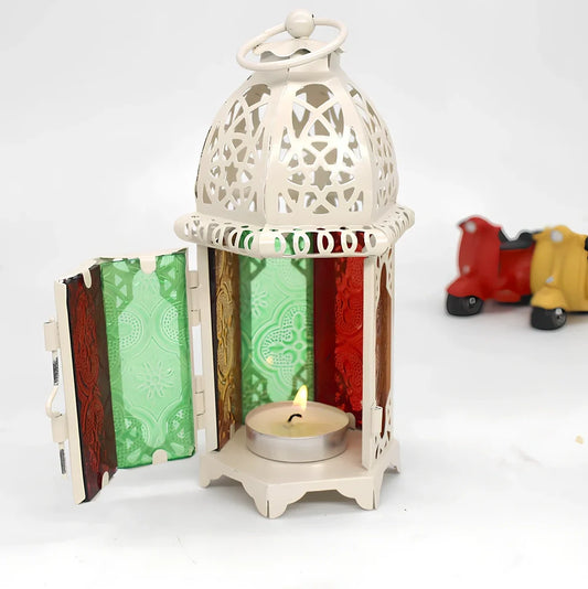 Wrought iron candle holder with 16cm height and 7cm diameter in black finish showing hanging design