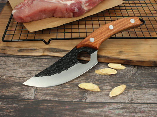 Handcrafted stainless steel boning knife with ergonomic handle for precision cooking tasks