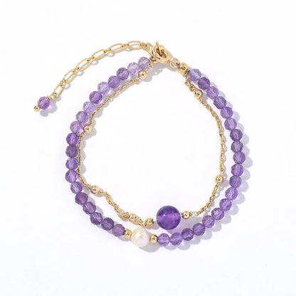 Amethyst colour crystal women's bracelet with diamond cut shapes and Chinese style design