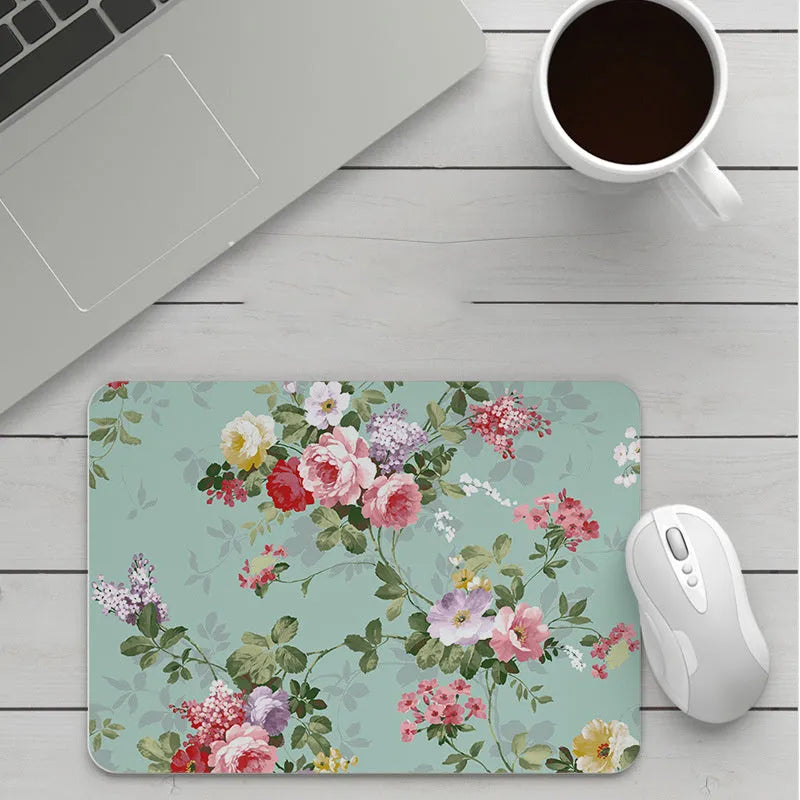 Customisable thick cartoon mouse pad with non-slip base, showing sample patterns like strawberry, cat, and whale designs.