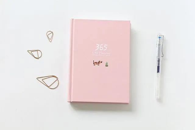 Hardback 365 day planner notebook, 13.5 x 18.2cm, 228 pages, 100gsm white cattle paper, Dark Green or Pink