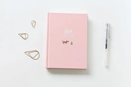 Hardback 365 day planner notebook, 13.5 x 18.2cm, 228 pages, 100gsm white cattle paper, Dark Green or Pink