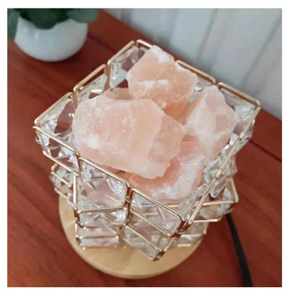 Himalayan salt lamp with wooden base and dimmable switch showing pink and orange salt rocks