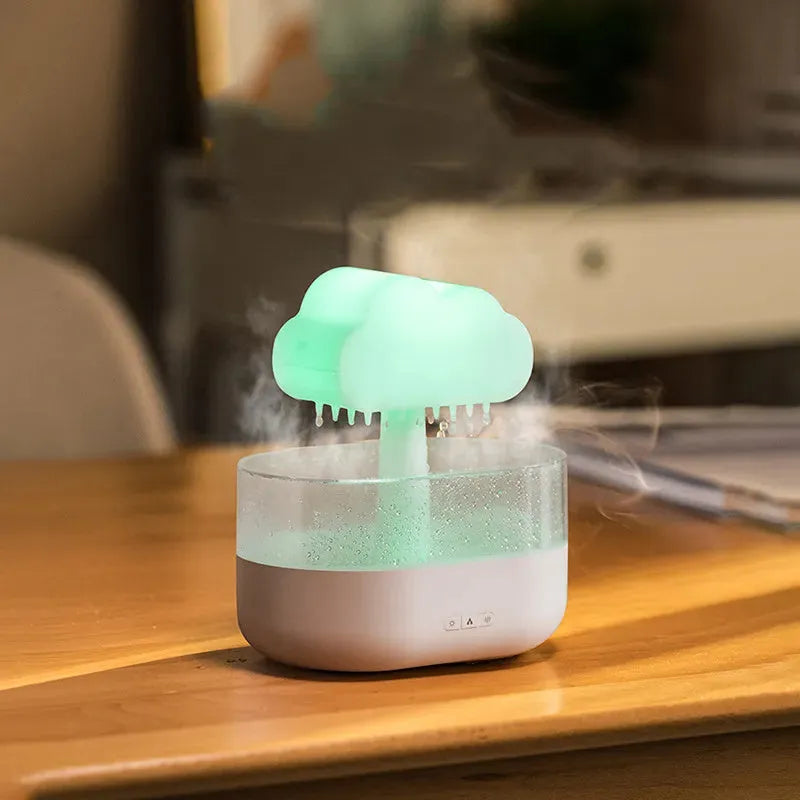 White rain cloud shaped humidifier with LED lighting and water droplet effect