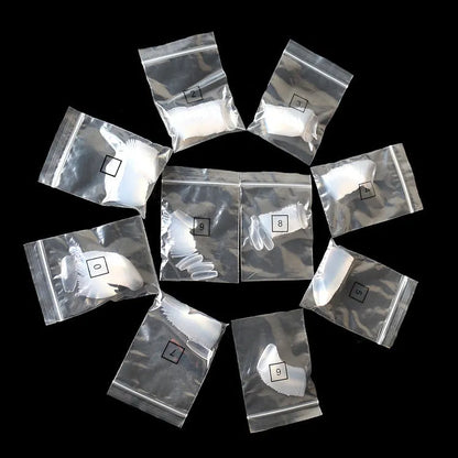 500 clear natural ABS artificial false nails in 10 different sizes for gel or acrylic application.