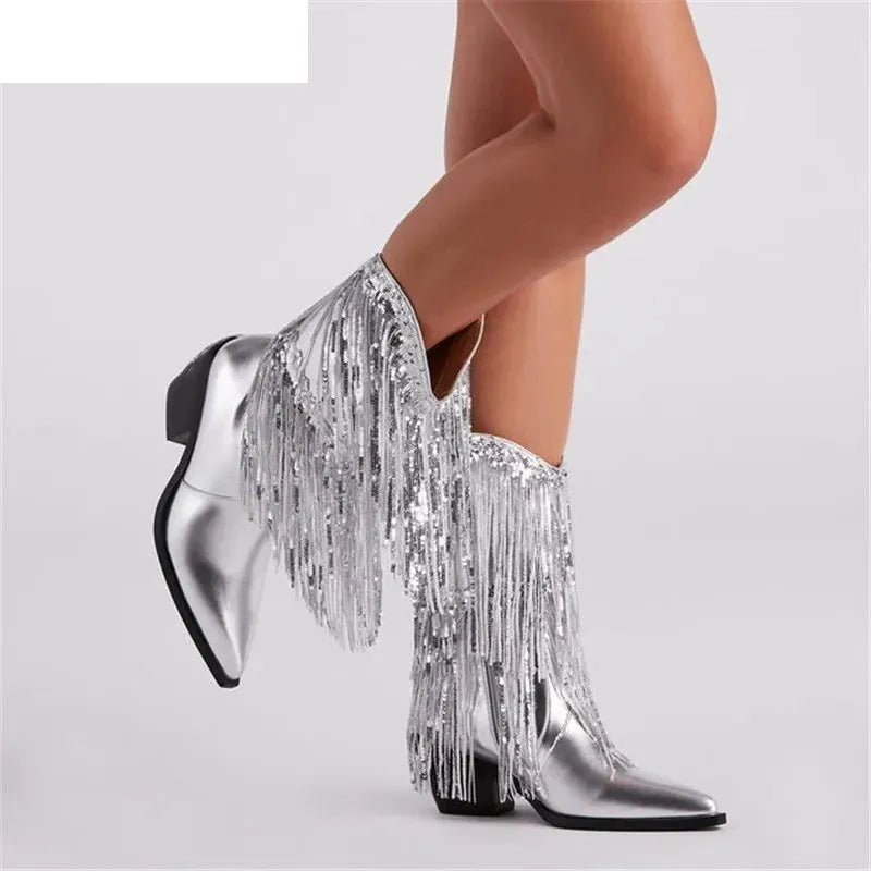 Women's black chunky heel tassel boots with pointed toe and 8cm+ stiletto heel on a neutral background