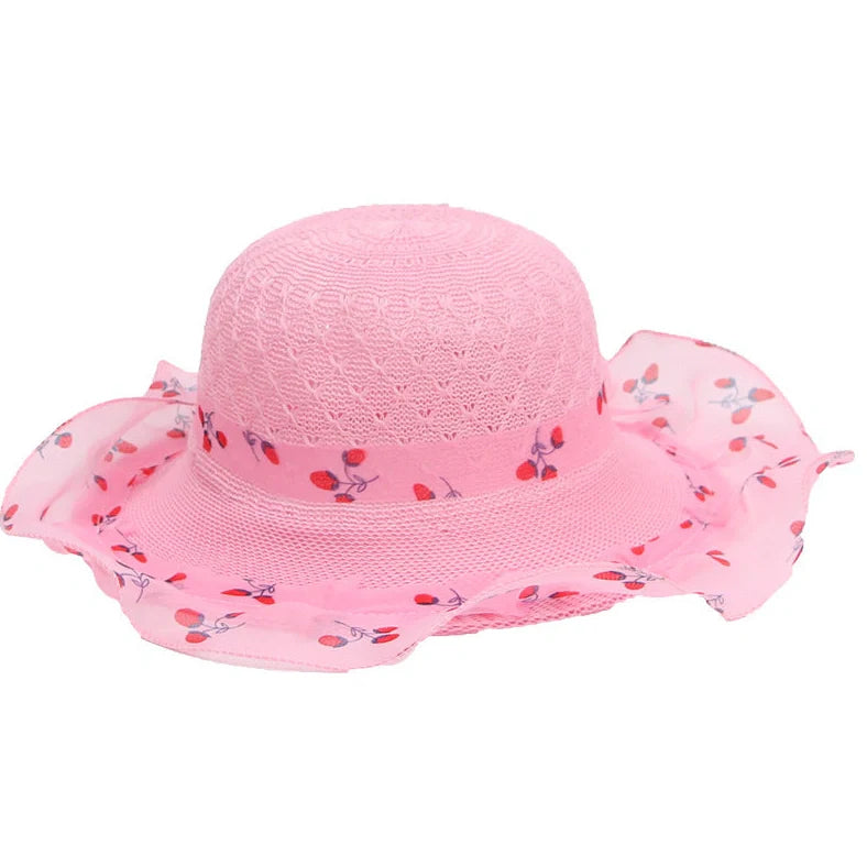 Children's princess straw hat with floral accents and wide brim for sun protection