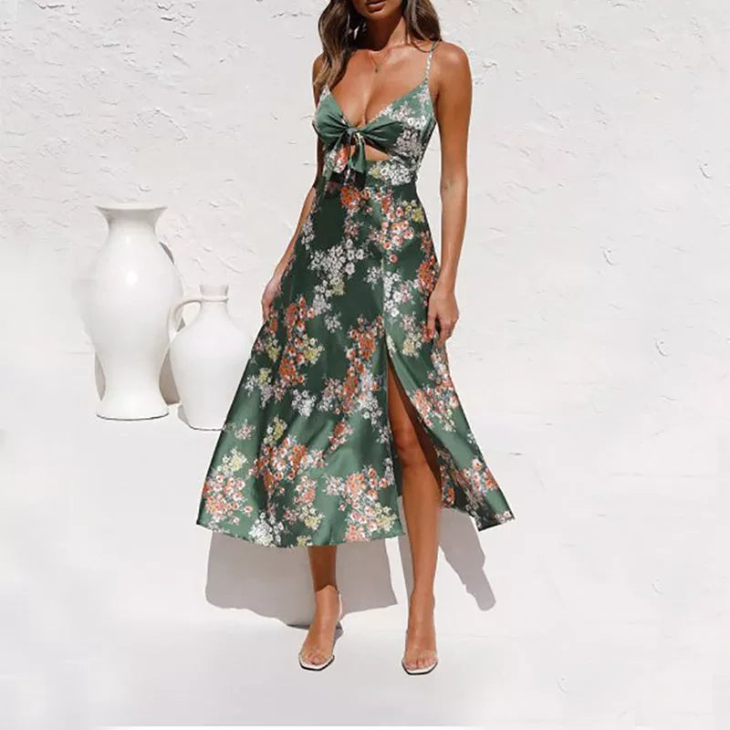 Women's sleeveless beach dress with flower print and hollow bowknot design