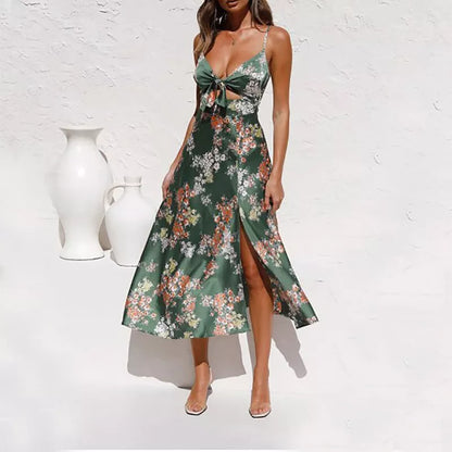 Women's sleeveless beach dress with flower print and hollow bowknot design