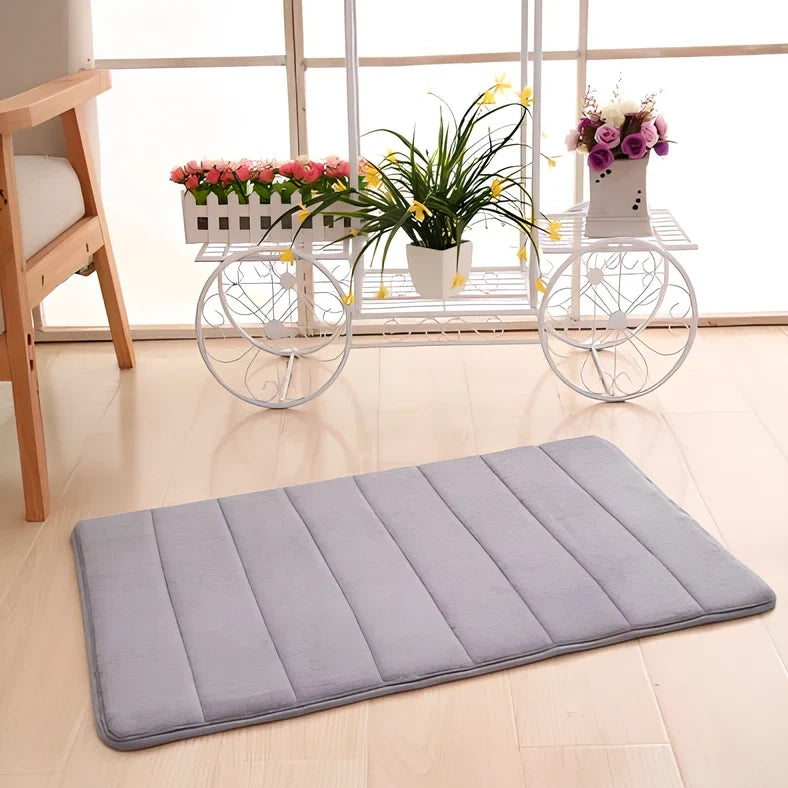 Memory foam bathroom carpet with coral fleece surface and non-slip latex backing in beige colour