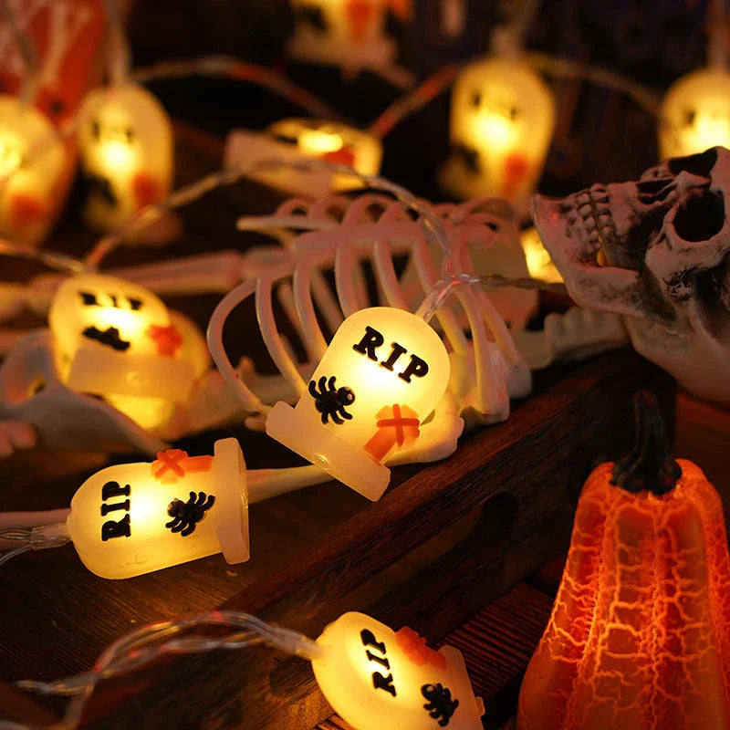 Warm glowing Halloween lighting chain with pumpkins, ghosts, and bats for indoor and outdoor decoration