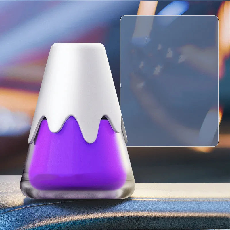 Car Mounted Snow Mountain Aroma: A glass-cased fragrance cream providing persistent scent for vehicles, measuring 9.1 x 6.9 cm with four distinct aroma options including purple bouquet and deep sea fog blue.