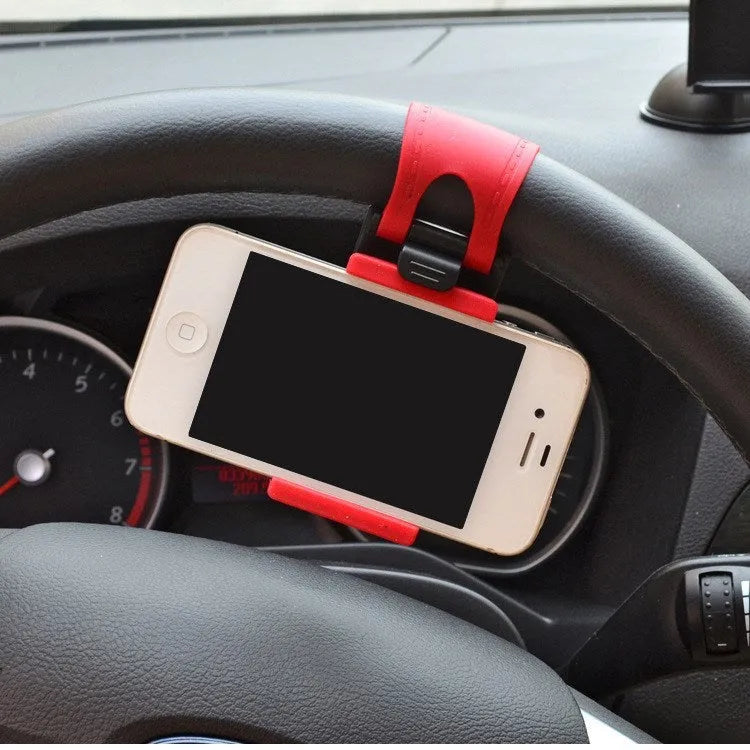 Black steering wheel phone holder with 75mm clip mounted on car wheel holding smartphone