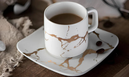 White ceramic coffee mug with double-wall construction showing cross-section insulation detail