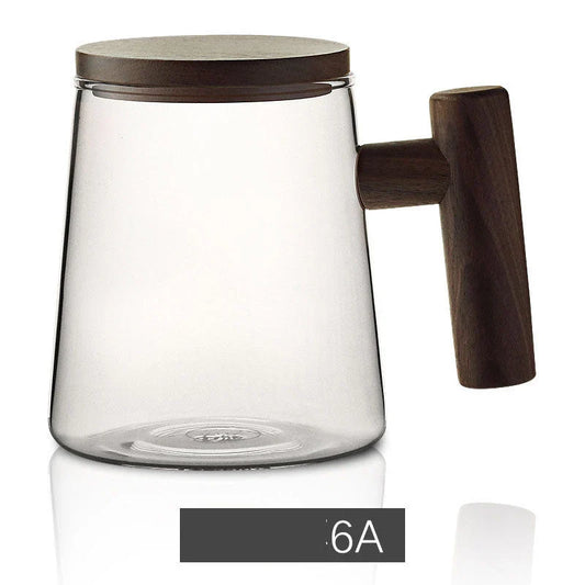 Premium glass tea infuser cup with wooden handle, offering a unique tea-water separation system and temperature-resistant construction for a refined tea experience.