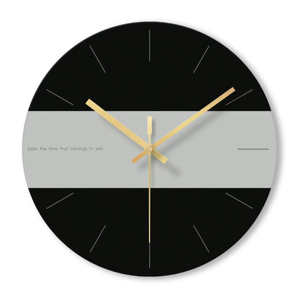A large, clear tempered glass wall clock with a minimalist transparent face on a light background.