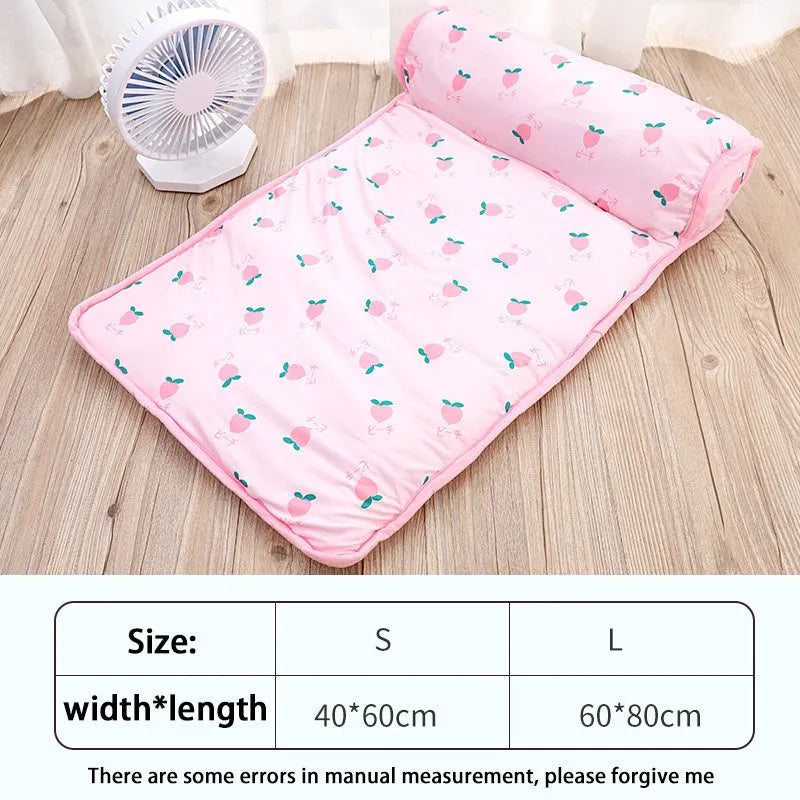 Pink blue green dog cooling mat on floor with pet, showing medium and large size options