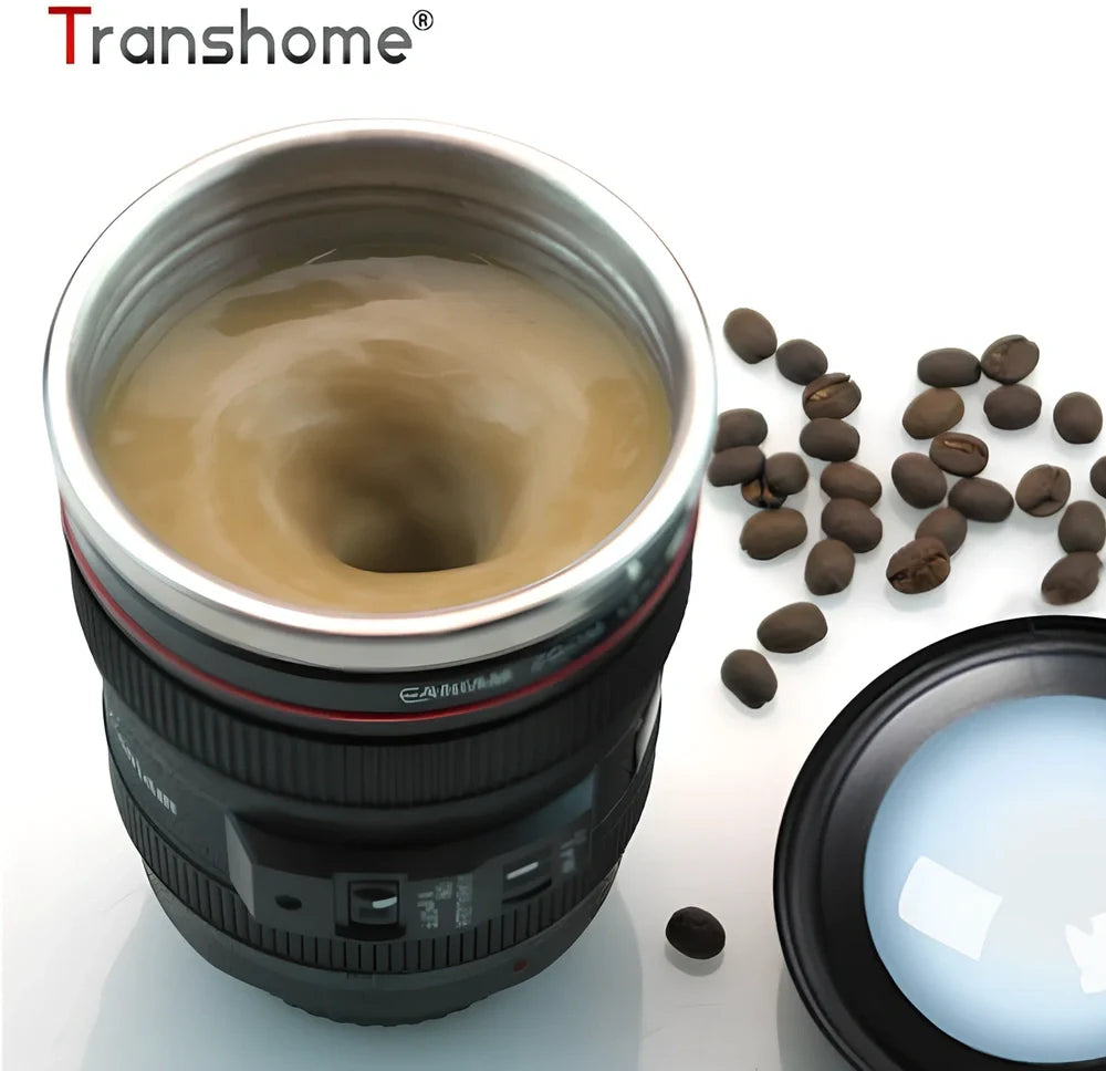 Self-stirring camera lens mug with stainless steel construction and automatic mixing button