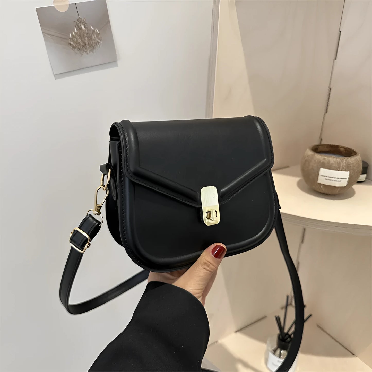 Soft PU leather messenger bag with clamshell opening in black, dark brown, khaki or white.